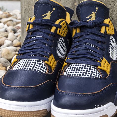 navy blue and gold jordans